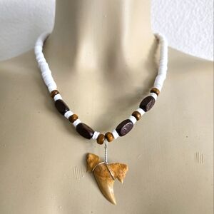 Brown and White Beaded Necklace with Shark Tooth Pendant